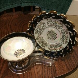 Elegant Vintage Black and Gold Tea Cup and Saucer Set